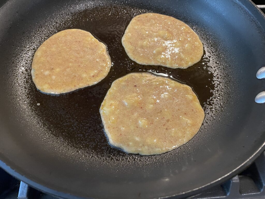 
Batter in pan on first side cooking