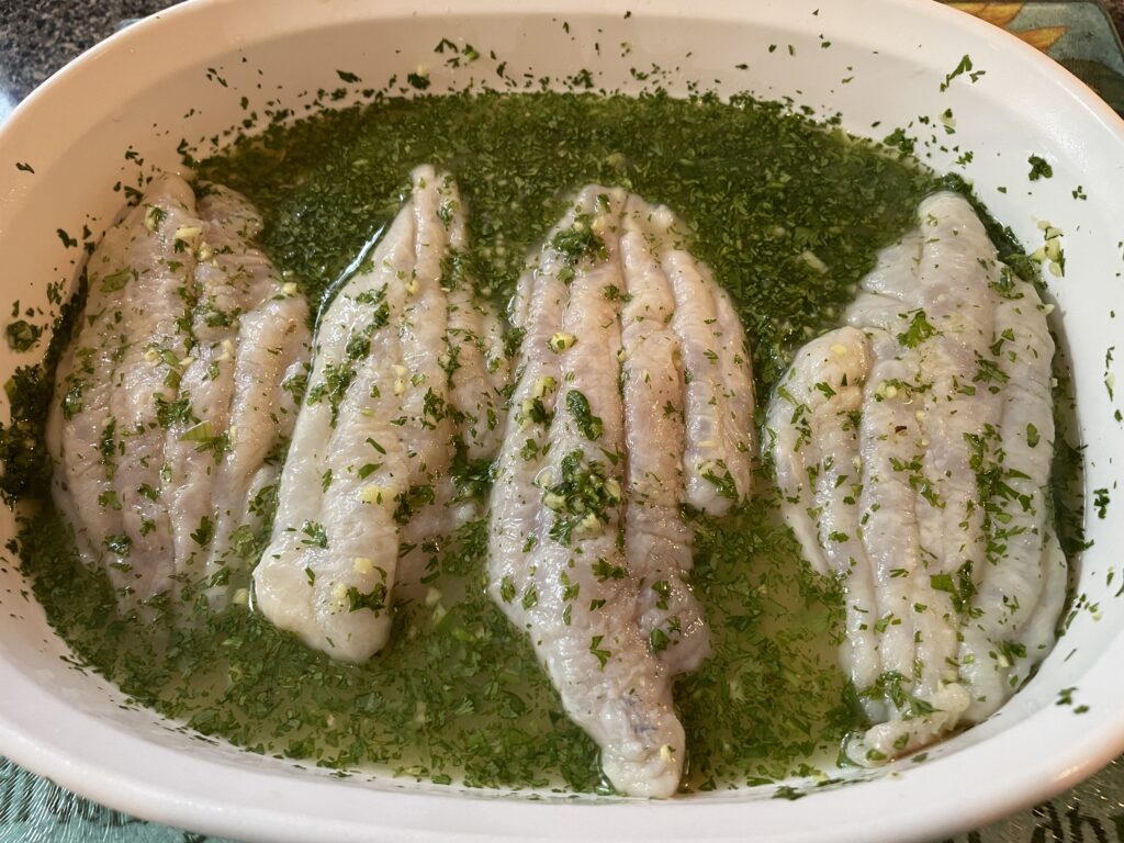 Catfish in the lime juice, brown sugar, cilantro, fresh ginger, green onion marinade