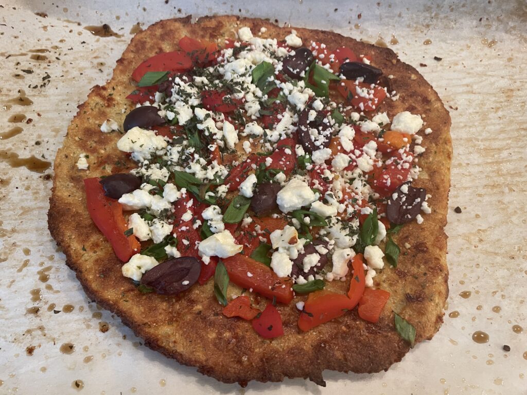 Cauliflower Crust Pizza with Feta, Roasted Peppers and Olives 