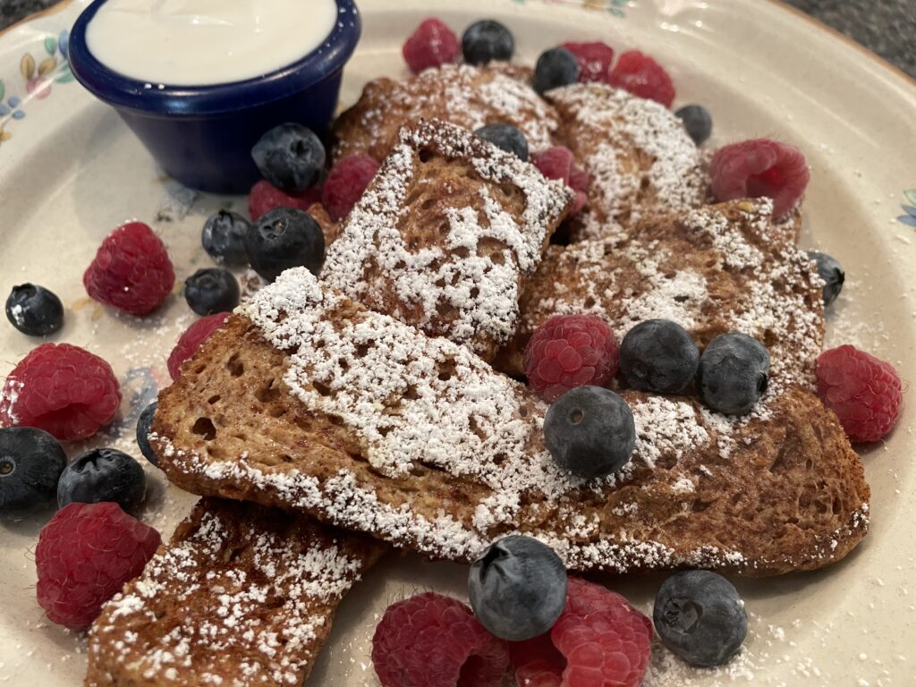 French Toast Sticks with fresh berries and maple yogurt dipping sauce