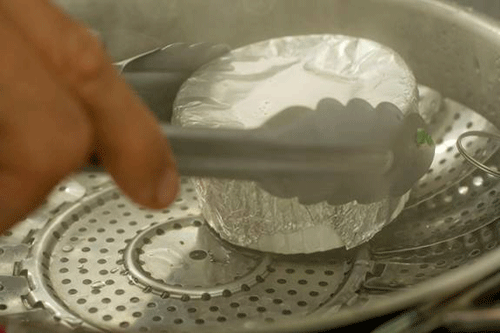 Steamed eggs covered ramekins