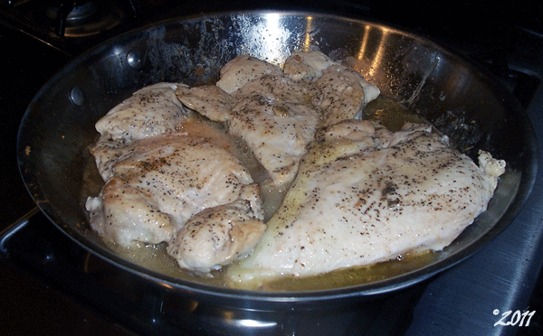 Browning the seasoned chicken